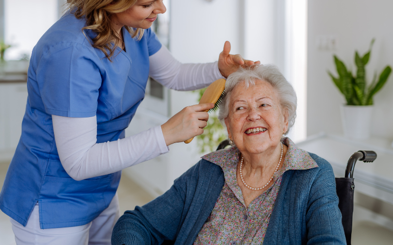 Caregiver enjoying conversation with a senior client