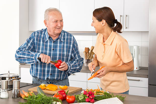 Caregiver preparing medication reminders